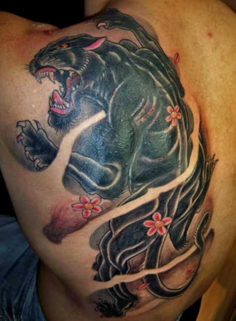 A tatuagem de blade o cara - pantera e sakura