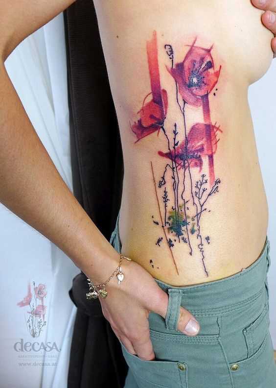 Fotos de tatuagem de macs no estilo aquarela lado da menina