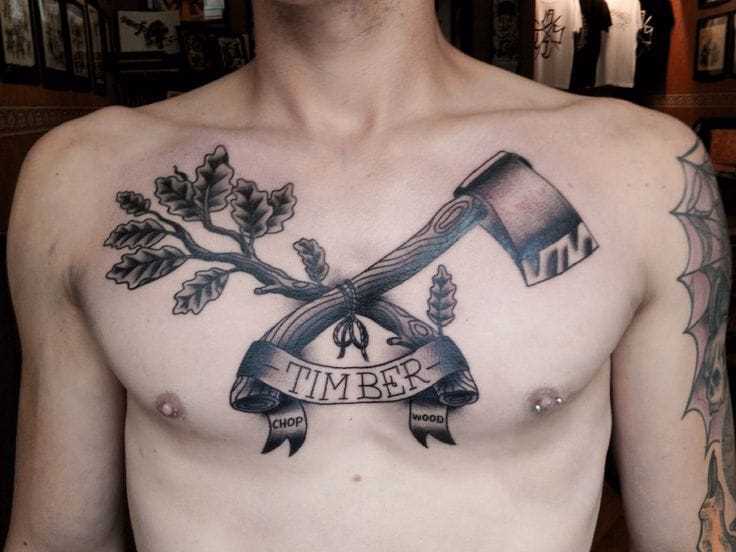 Tatuagem de machado de assis com o ramo na cara no peito