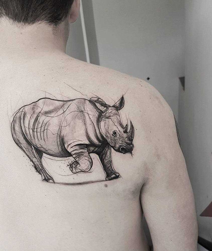 Tatuagem de rinoceronte blade cara