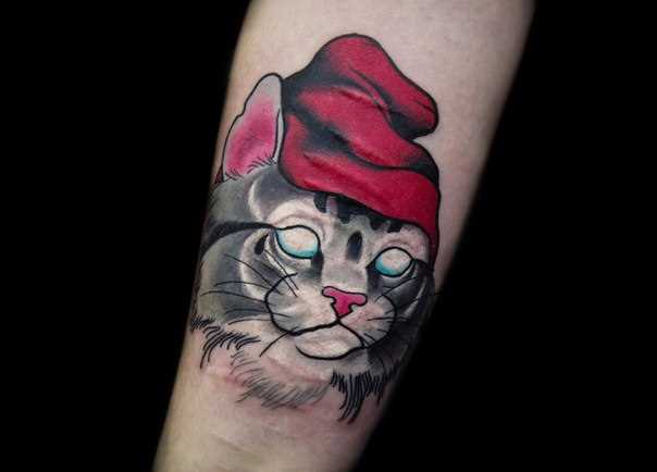 Tatuagem feminina no antebraço - gato