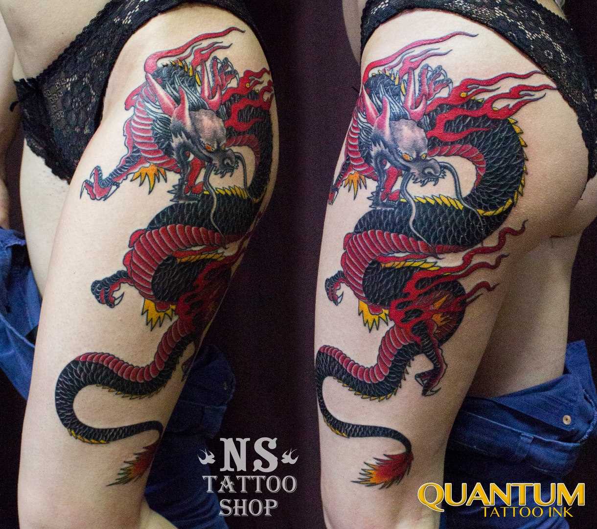 Tatuagem na coxa da menina - dragão