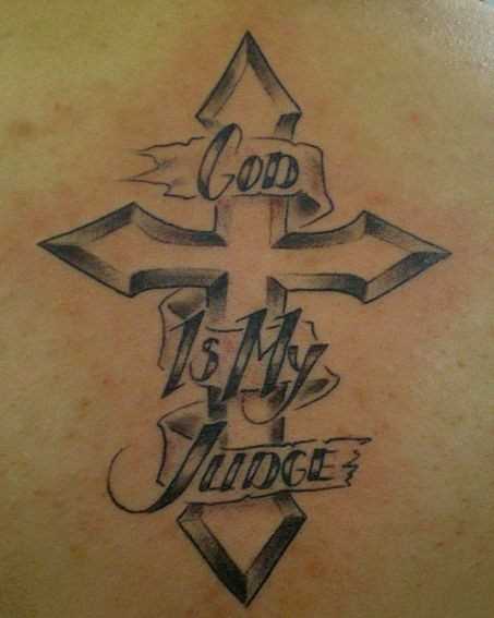 Tatuagem na espinha cara - a cruz e a inscrição