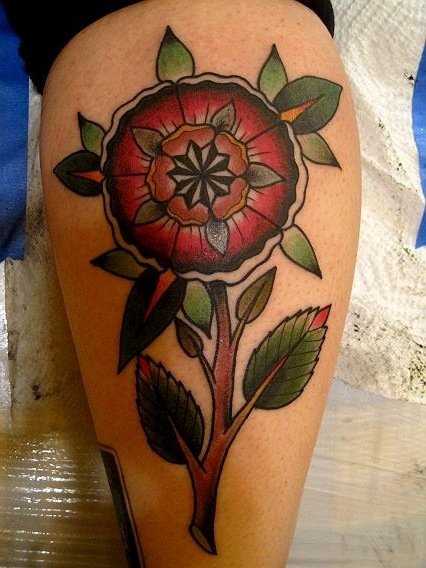 Tatuagem na perna da menina - mandala em forma de flor