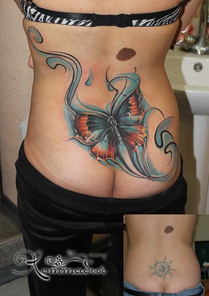 Tatuagem nas costas da menina - borboleta