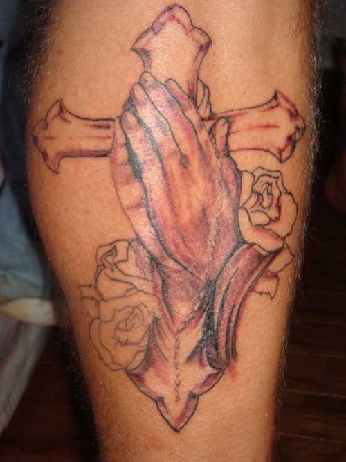 Tatuagem no antebraço cara - a cruz e na palma da mão