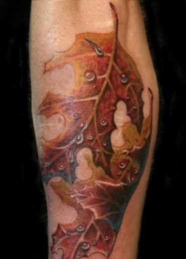 Tatuagem no antebraço cara - folhas