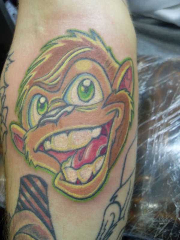 Tatuagem no antebraço para o homem - macaco alegre