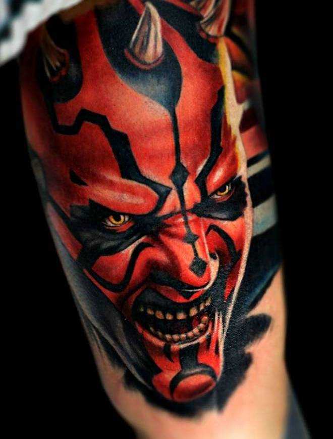 Tatuagem no braço de um cara - diabo