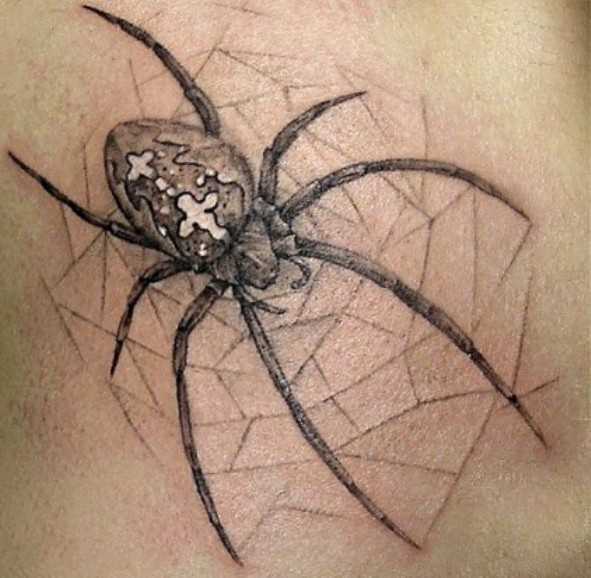 Tatuagem no peito de um cara - de teia de aranha com uma caveira