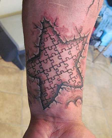 Tatuagem no pulso cara - de quebra-cabeça em forma de estrela