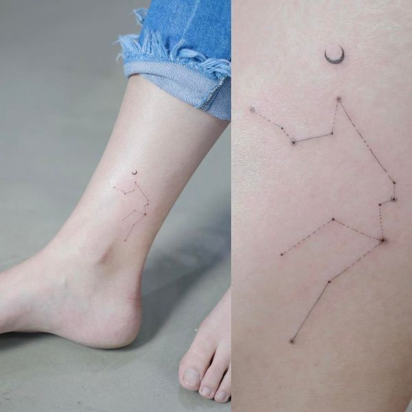 Uma bela tatuagem de Aquário na perna